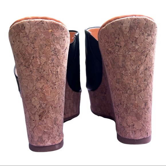 Madden Girl
Nuriel Cork Wedges  
Black
4-1/2" Cork Wedge Heel - Picture 9 of 16